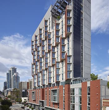 apartment building with blue sky