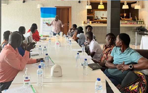 group of people sitting at a conference table